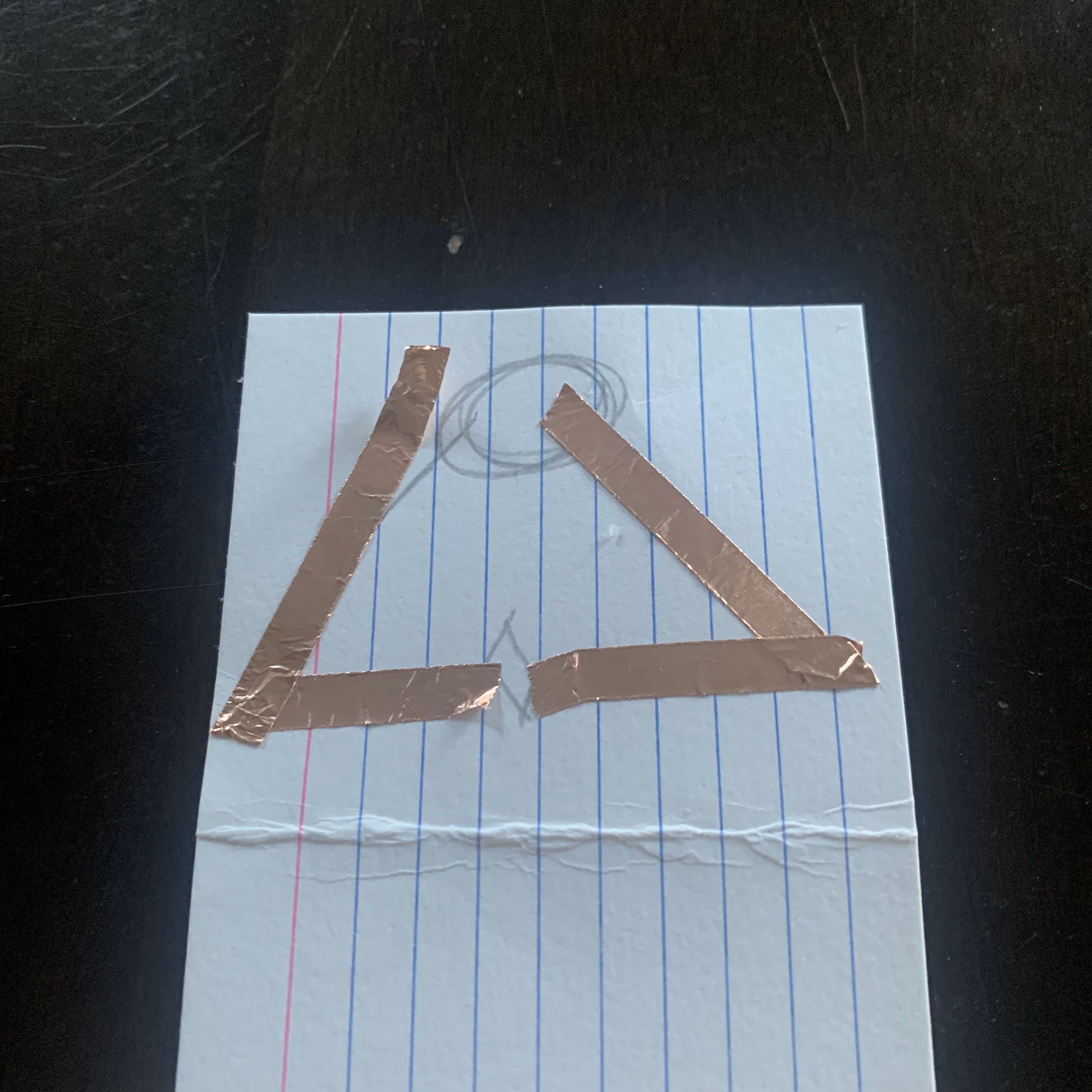 Applied Copper Tape in the shape of the triangle sketch.