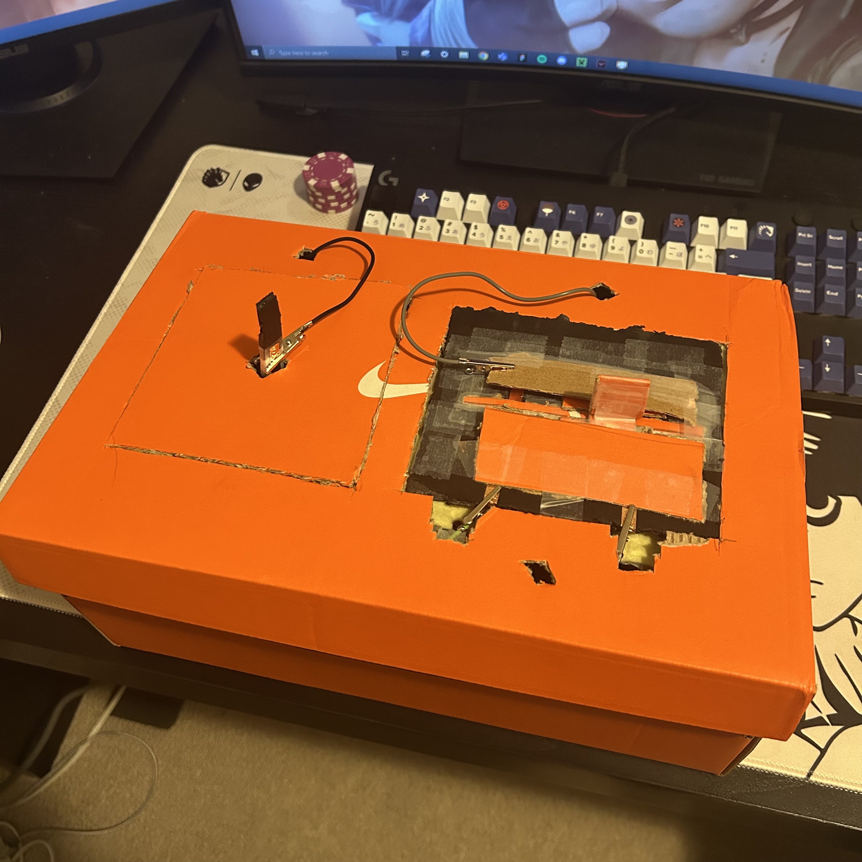 My Homemade Joystick Controller With a Slider made of cardboard and conductive materials.