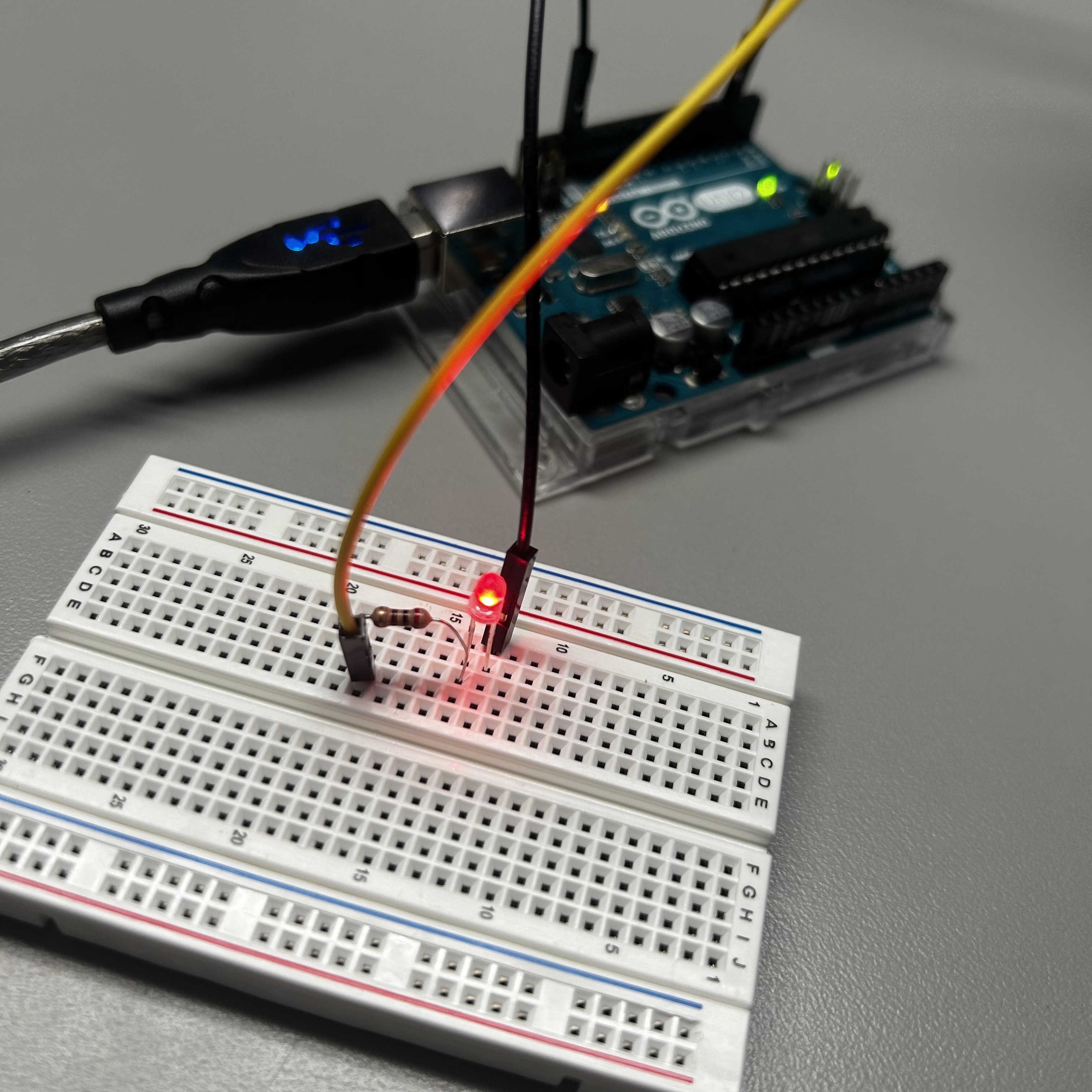 My third successful circuit with the red LED light. This time using a resistor in the mix.