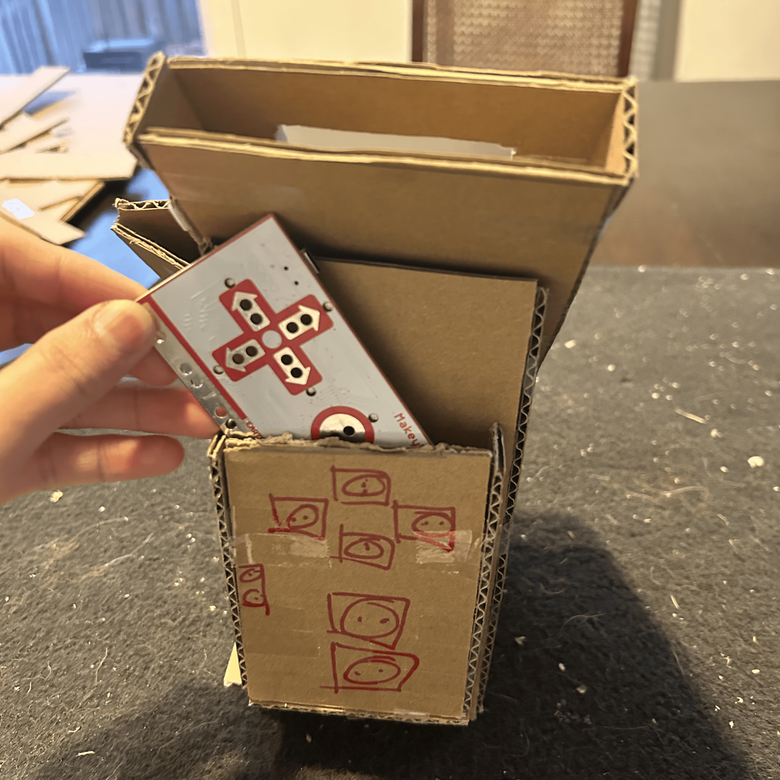 Created an external slot for the makey makey allowing access for easy fixes if the machine ever has digital problems and enables for the wires from the makey makey connections to be hidden.